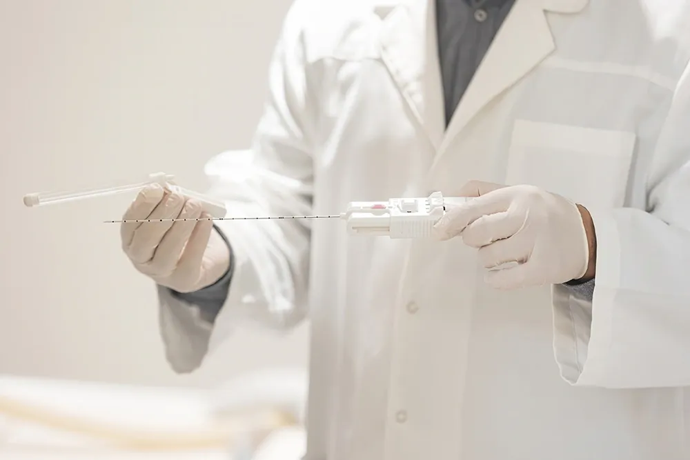 Specialist performing an advanced transperineal prostate biopsy procedure