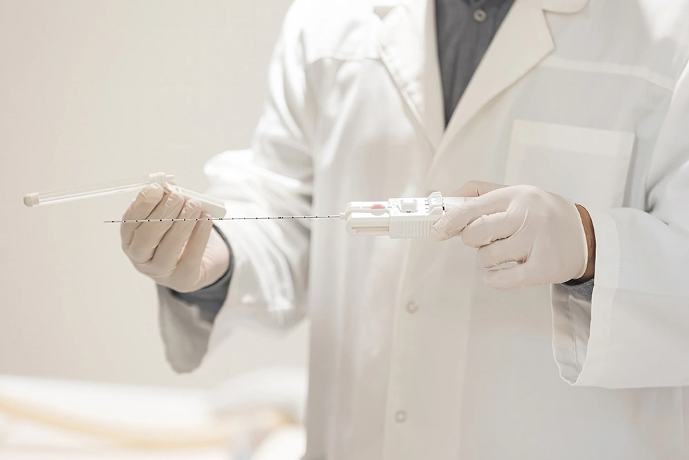 Specialist performing an advanced transperineal prostate biopsy procedure